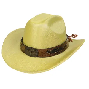 Close-up of yellow western cowboy hat with brown leather band and bull head buckle