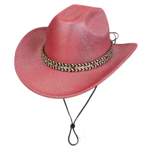 Close-up of a pink glitter cowboy hat with silver trim and an adjustable black chin strap