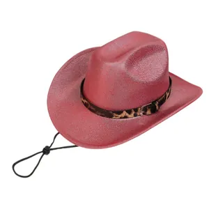 Close-up of red glitter cowboy hat with leopard print band and adjustable chin strap
