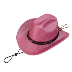 Detail of glittery pink western cowboy hat with metallic bull head buckle and leather strap