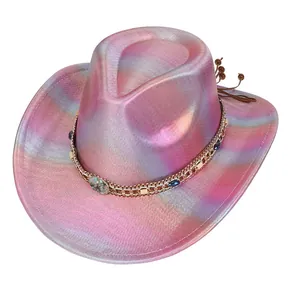 Iridescent cowboy hat detail with gold chain, blue gemstones and shell decoration