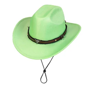 Detail of green felt cowboy hat with bull head ornament and studded leather band
