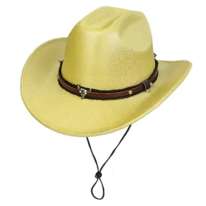 Detail of yellow cowboy hat featuring a metal bull head pendant and braided band