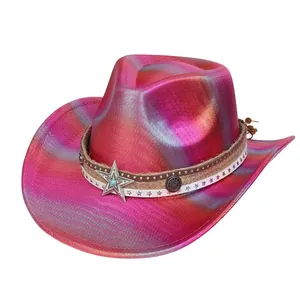 Close-up of metallic pink cowboy hat band with star studs and turquoise accents