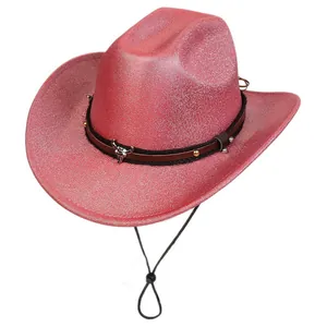 Detail of glittery rose red cowboy hat with silver bull head emblem and leather band