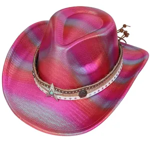 Detail of metallic pink holographic cowboy hat with silver star and turquoise accent