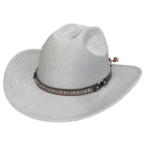Close-up of glittery silver cowboy hat with leather band and geometric metal studs