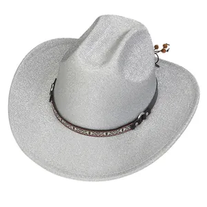 Macro detail of silver glitter cowboy hat with ethnic pattern decorative band