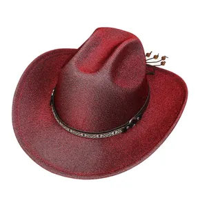 Detail of red glitter cowboy hat featuring a black leather band and wooden bead tassels