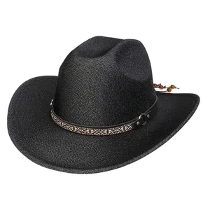 Detail of black cowboy hat featuring ethnic woven band with leather cords and metal ring