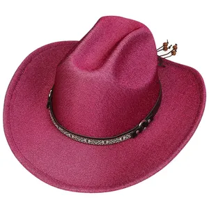 Detail of glitter cowboy hat with woven leather band, silver studs and wooden beads