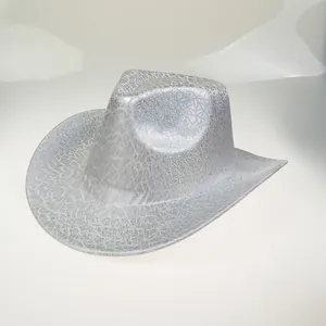 Close-up of a shiny silver cowboy hat with a shimmering geometric laser-cut grid texture