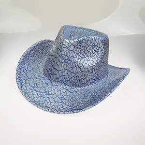 Close-up of cowboy hat showing silver-gray finish with blue geometric crackle patterns