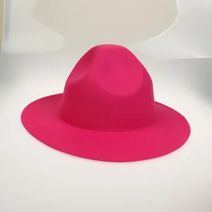 Close-up of the smooth wool felt texture on this magenta fedora jazz hat for women