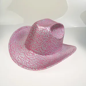 Detail showing the shiny silver and pink crackle texture on the curved cowboy hat brim