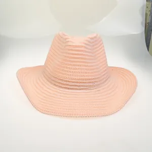 Classic peach pink woven wide brim cowboy hat with textured knit fedora crown design
