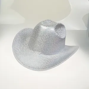 Detailed close-up of holographic silver cowboy hat with metallic cracked texture finish
