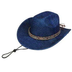 Detail of navy denim cowboy hat featuring woven patterned band and adjustable chin strap