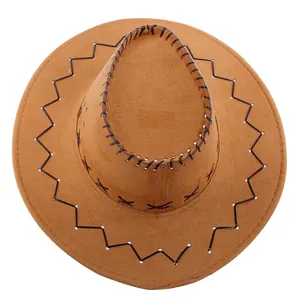 Detail of brown suede cowboy hat featuring black zigzag stitching and white polka dot trim