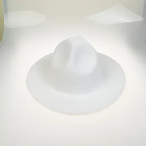 Detailed view of a white wool felt fedora hat featuring a classic indented crown