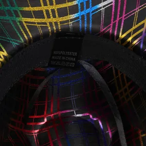 Detail of the 100% polyester wash label inside the rainbow striped party fedora hat