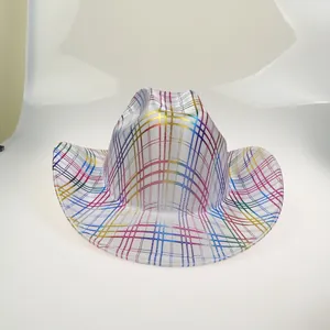 Top down view of white cowboy party hat with colorful rainbow metallic grid patterns