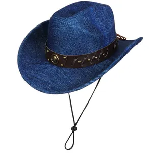 Detail of blue western fedora hat featuring leather band with gold rivets and chin strap