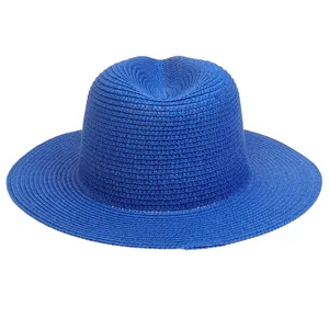 Detail of royal blue woven straw Panama hat featuring wide brim and classic crown design