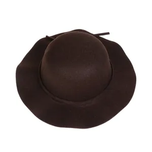 Top view detail of dark brown wool felt fedora showing thick texture and wavy brim