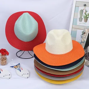 Detailed view of woven Panama sun hats in multiple vibrant colors and textures
