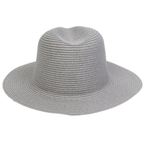 Detail of grey wide brim straw panama hat featuring dense spiral woven texture