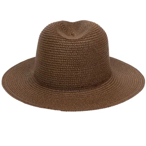 Detailed view of the fine texture on this brown woven wide-brim Panama straw hat