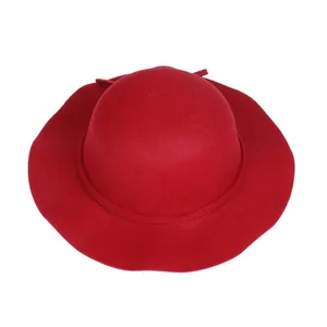 Detailed top view of red wool felt wide-brimmed fedora hat with elegant round crown