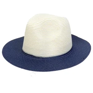Detailed weave texture of a two-tone Panama straw hat with ivory crown and navy brim