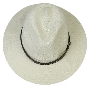 Top-down view of woven hollow straw fedora hat with metal rivets on leather band