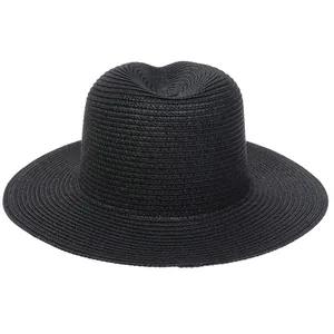 Detailed close-up of high-quality woven texture on black straw Panama sun hat