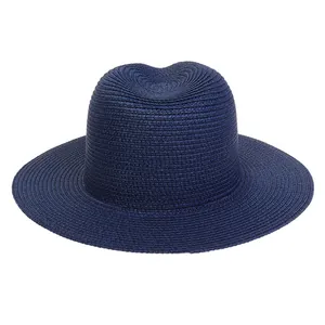Detail showing the fine spiral weave texture of this navy blue straw Panama beach hat