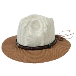 Close-up of contrast weave Panama hat featuring leather band with metal rivets
