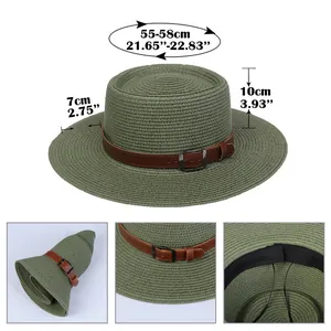 Detail view of foldable straw hat with leather belt, metal buckle and sweatband features