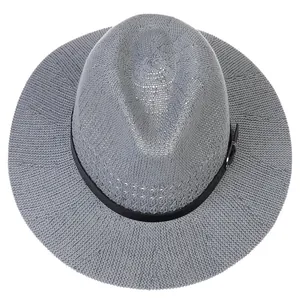 Close-up of gray woven fedora hat with black band and silver metal buckle detail