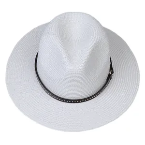 Top view showing textured weave of white Panama straw hat with studded leather band