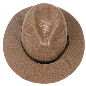 Top-down view of dark brown straw fedora with black leather band and metal buckle