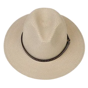 Top view of beige straw Panama hat featuring a slim leather band with metal rivets detail