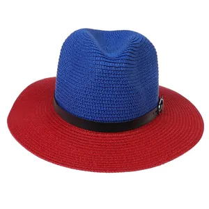 Detail of red and blue color-block straw fedora hat with black leather buckle band