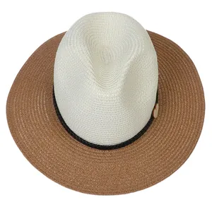 Top-down view of woven straw fedora with contrast brim and wooden button detail