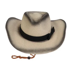 Detalle de sombrero de paja degradado con textura tejida fina y cordón ajustable