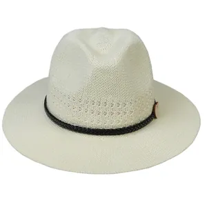 Close-up of cream woven fedora hat with black braided band and small wooden heart charm