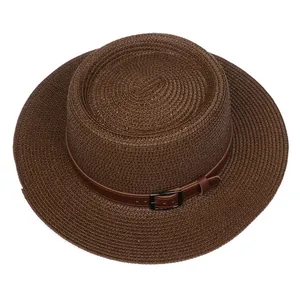 Close-up of the woven texture and faux leather belt detail on this straw sun hat