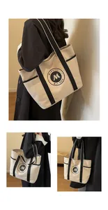 Bolso tote grande de lona con asas en contraste y estampado de logotipo circular