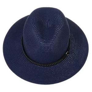 Detailed top view of navy blue woven Fedora with studded black leather band trim